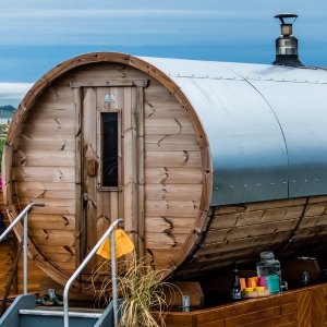 The Island Sauna in Portland, Dorset. The sauna sits on the edge of the sea with views of Portland Castle