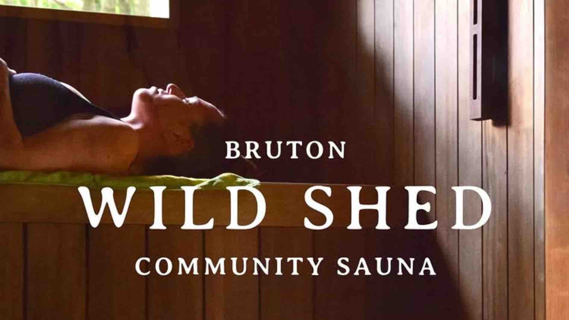 A woman lies in the heat of the Wild Shed community sauna in Bruton, Somerset