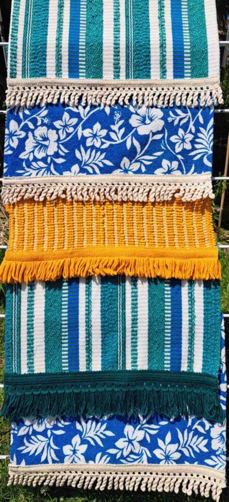 A range of sauna mats in vintage fabrics and fringing
